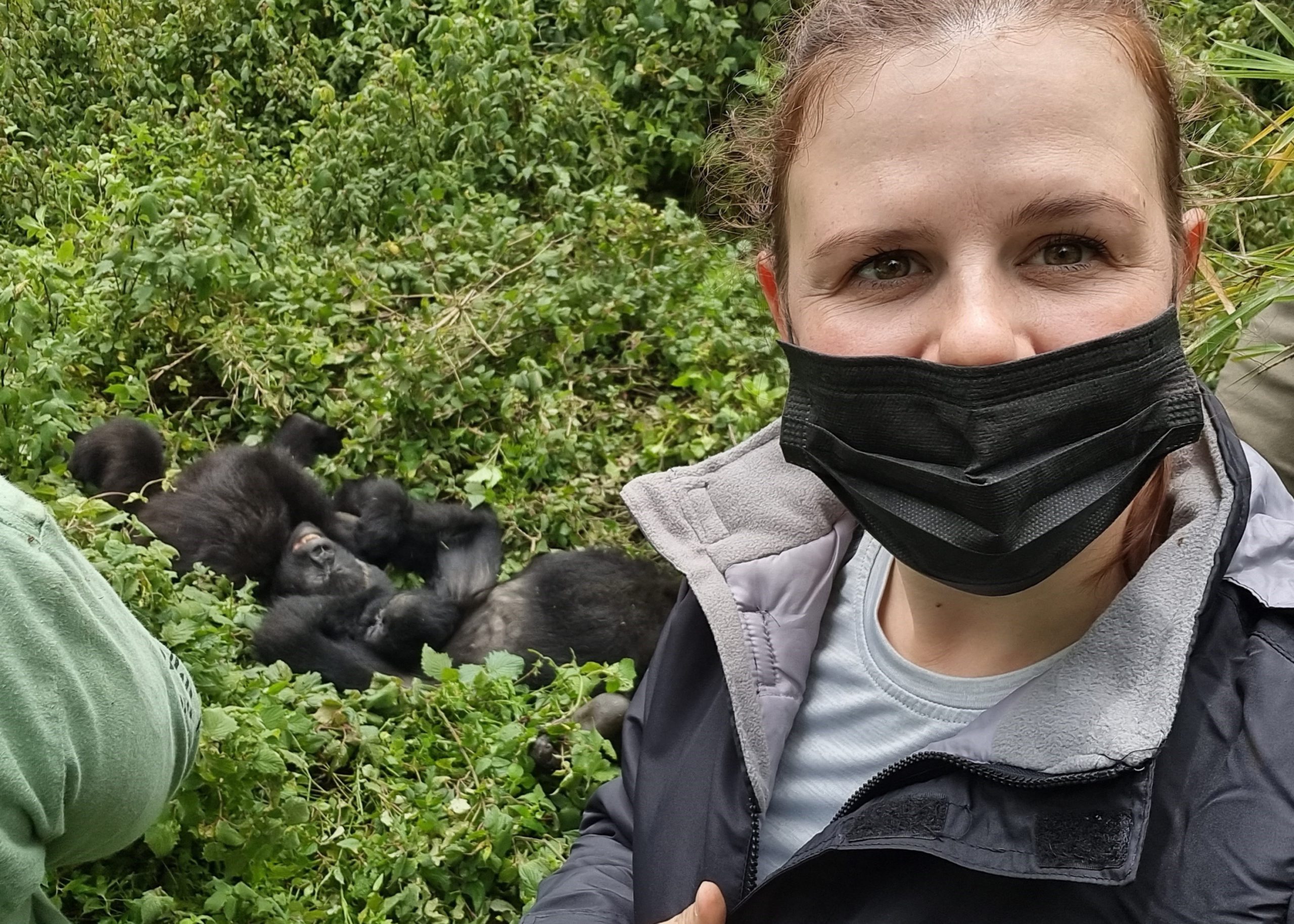 Allison-bothma-rwanda-3 Allison in front of two gorilla juveniles