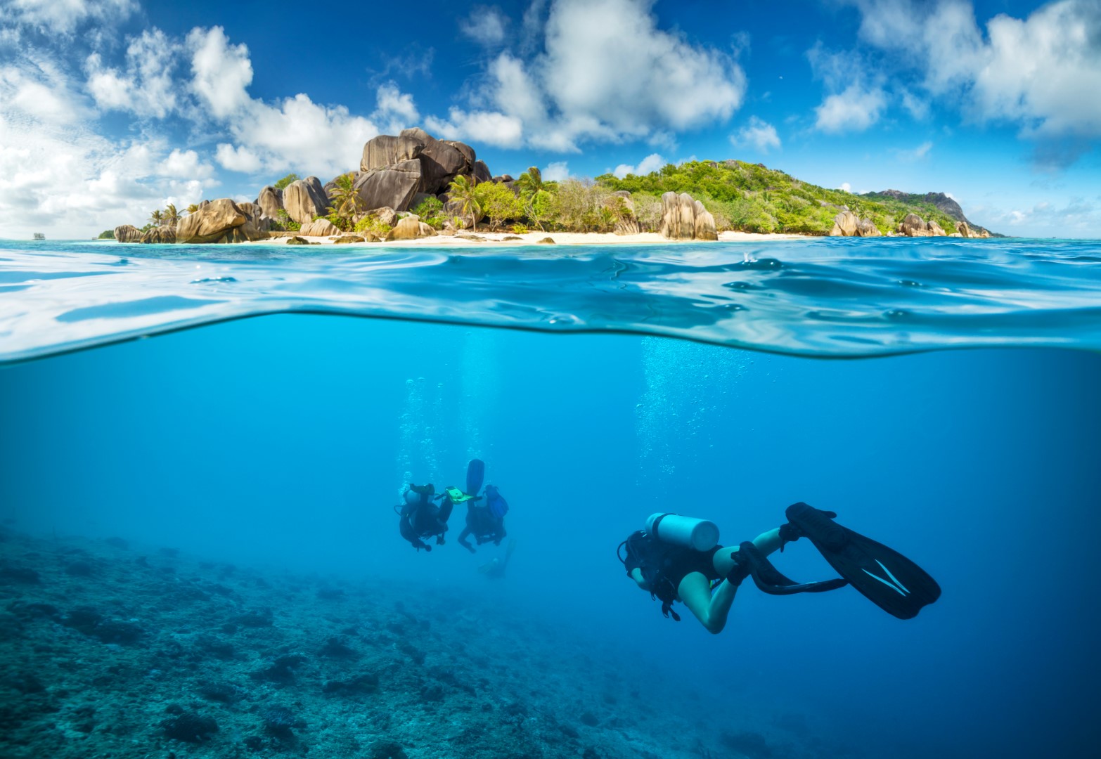 Divers below the surface in Seychelles Snorkelling in Seychelles