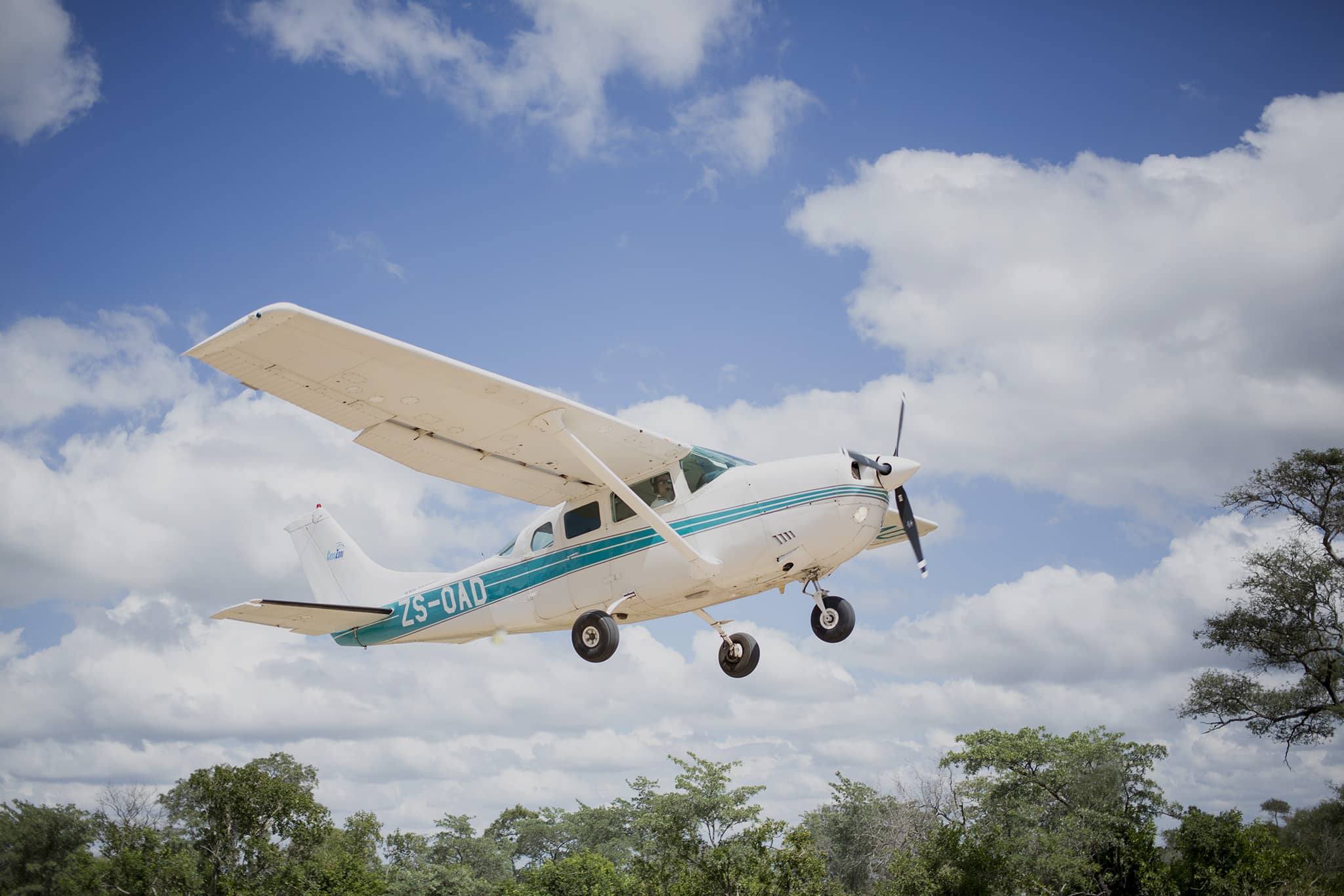 Botswana Moremi Okovango Delta airplane flying sunny Plane flying overhead